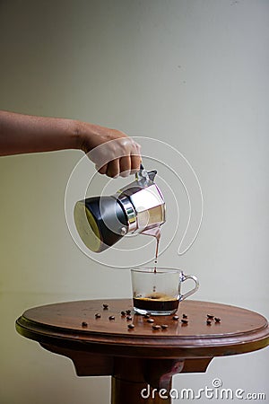 Making espresso using italian traditional coffee maker Stock Photo