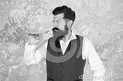 Making hair look magical. man looking elegant. Specialized in classic shave. Bearded man retro razor. Shaving razor kit Stock Photo