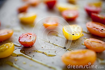 Making half dried tomatoes Stock Photo