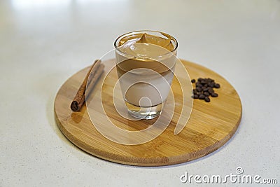 making Korean coffee, dalgona coffee on white quartz kitchen table Stock Photo