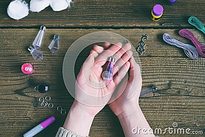 Making magic crystal of wishes from cotton wool, dyes and glitter. Children`s DIY project. Handmade gift for Birthday, Mother`s Stock Photo