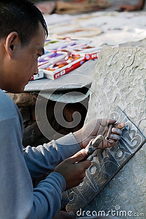 Making a Mani Stone Editorial Stock Photo