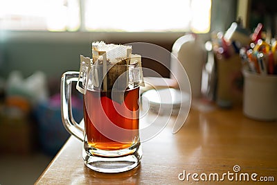 Making pour over coffee in a beer mug at home Stock Photo