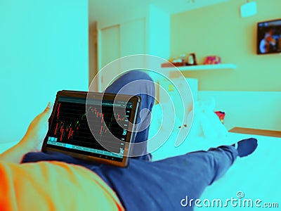 Making trading online on the smart phone. Check trend graph Stock Photo
