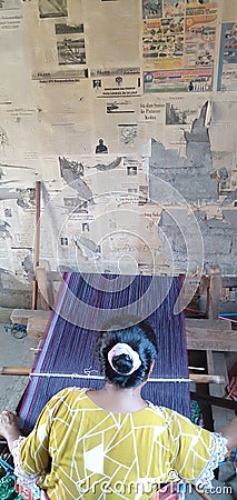 making traditional weaving on Harapan Beach by local residents Editorial Stock Photo