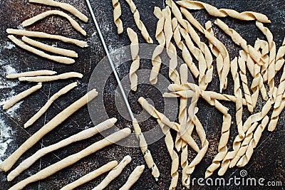 Making whole wheat flour pasta fusilli al ferro Stock Photo