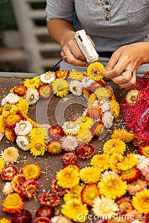 Making wreath autumn colorful strawflower Stock Photo