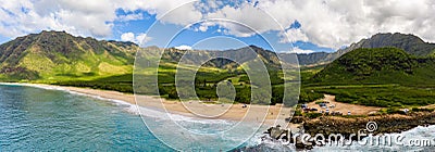 Makua beach and valley on west coast of Oahu in aerial shot over ocean Stock Photo