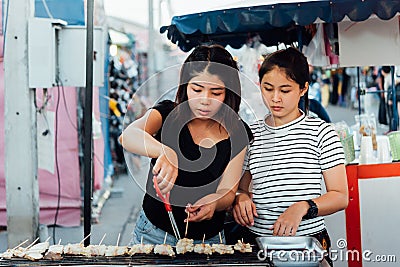 Mala grilled meat with sichuan pepper at market Editorial Stock Photo