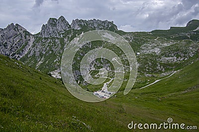 Mala Spice Cime Verdi peaks view from Mangart saddle, Slovenia's Highest Panoramic Road, heavy clouds before rain, foggy day Stock Photo