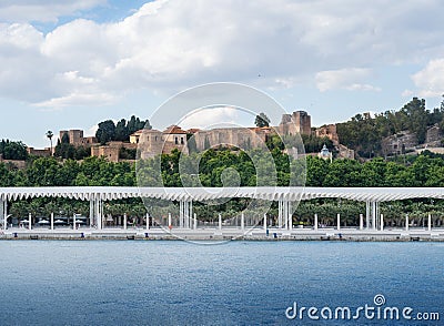 Malaga Skyline with Alcazaba Fortress and Paseo del Muelle Uno - Malaga, Andalusia, Spain Stock Photo