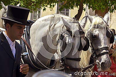 MALAGA, SPAIN - AUGUST, 14: Horsemen and carriages at the Malaga August Fair on August, 14, 2009 in Malaga, Spain Editorial Stock Photo