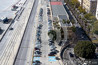 Top view of the parking lot, cars, roads. Parking spaces for the disabled Stock Photo