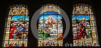 The Last Supper scene on stained glass windows in Malaga Cathedral Editorial Stock Photo