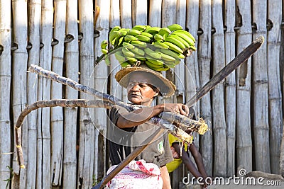 Malagasy woman with bananas Editorial Stock Photo