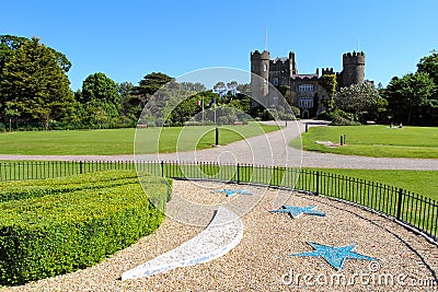 Malahide castle gardens and facade Stock Photo