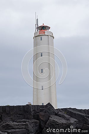 Malarrif Lighthouse, SnÃ¦fellsnes, Iceland with lava cliffs Stock Photo