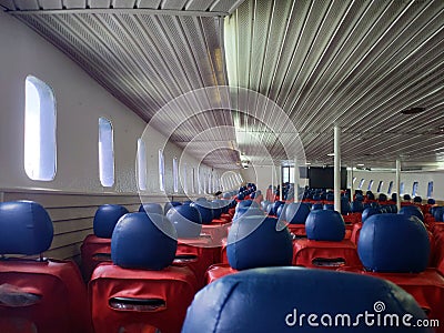 Malaysia - June 2019: Green and blue seats on the boat Editorial Stock Photo