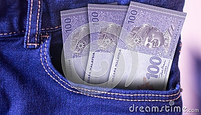 Qatar 5 Riyals Banknotes in Pocket of Jeans Stock Photo