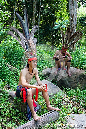 Malaysian aborigines in national costumes Editorial Stock Photo