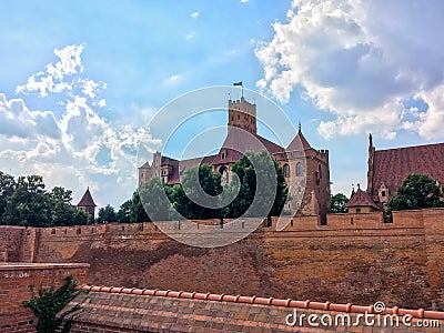 Malbork Castle in Poland, medieval fortress built by the Teutonic Knights Order. Summer 2018. Stock Photo