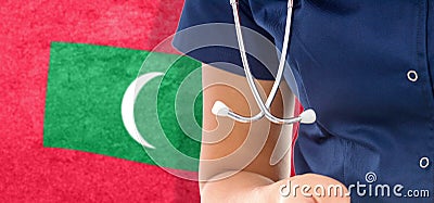 Maldives flag female doctor with stethoscope Stock Photo