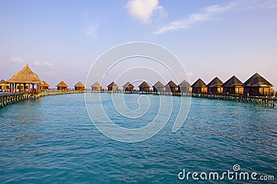 Maldives. Villa on piles on water at the time su Stock Photo