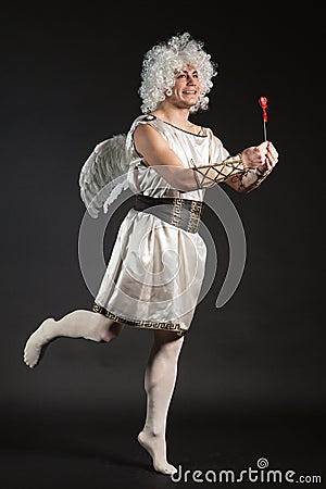 Male angel Cupid with a love heart. Valentine's Stock Photo