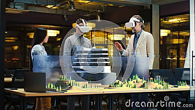 Male architect presents project of city in virtual reality Stock Photo