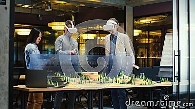 Male architect presents project of city in virtual reality Stock Photo