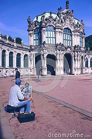 Male artist painting a picture of the museum building Editorial Stock Photo