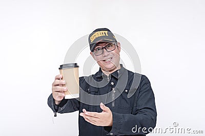A male asian security guard recommends a cup of coffee. Cafe advertisement concept. Isolated on a white background Stock Photo