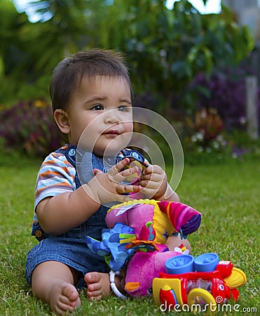 Male baby in garden Stock Photo