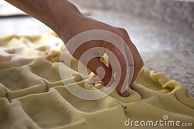 Male baker prepares cake Stock Photo