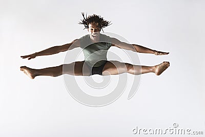 Male Ballet Dancer Jumping On White Background Stock Photo