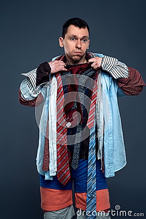 Male buyer dressed in many clothes Stock Photo