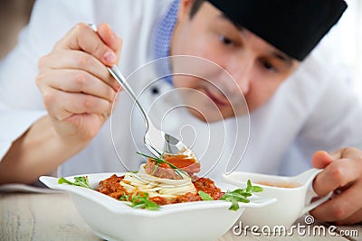 Male chef in restaurant Stock Photo