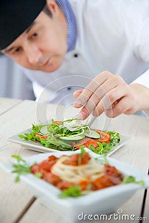 Male chef in restaurant Stock Photo