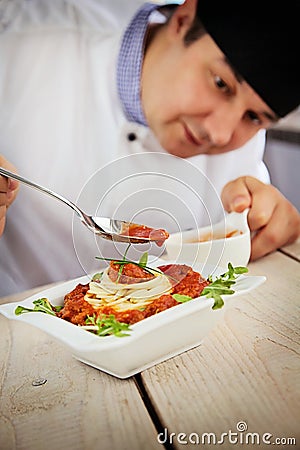 Male chef in restaurant Stock Photo