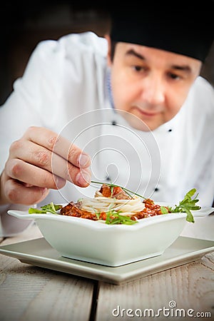 Male chef in restaurant Stock Photo