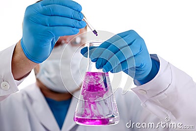 A male chemist holds test tube of glass Stock Photo