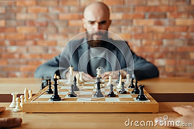 Male chess player, thinking process Stock Photo