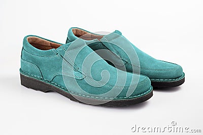 Male cyan leather shoes on white background, isolated product, top view. Stock Photo