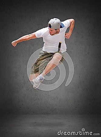 Male dancer jumping in the air Stock Photo