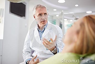 Male dentist on working place in dental practice Stock Photo