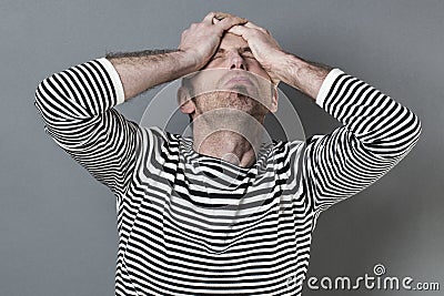 Male disaster concept for shocked middle age man Stock Photo