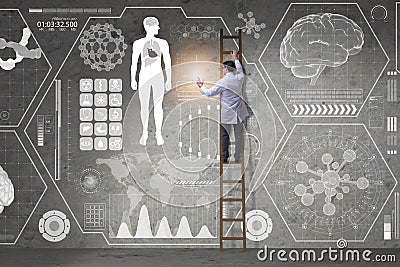 The male doctor climbing ladder in medical concept Stock Photo