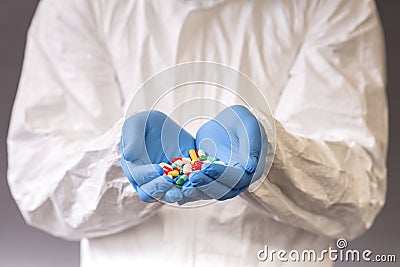 Male doctor with goggles and protective suit Stock Photo