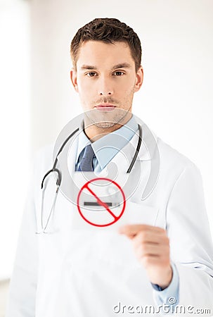 Male doctor holding no smoking sign Stock Photo