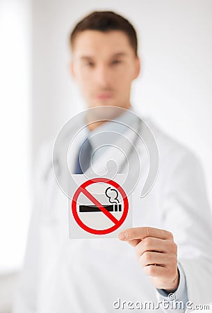 Male doctor holding no smoking sign Stock Photo